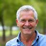 Portrait of David Rodriguez, a successful Veridian Bloom client, appearing energetic and confident.