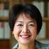 Portrait of Lisa Chen, a satisfied Veridian Bloom client, looking vibrant and healthy.